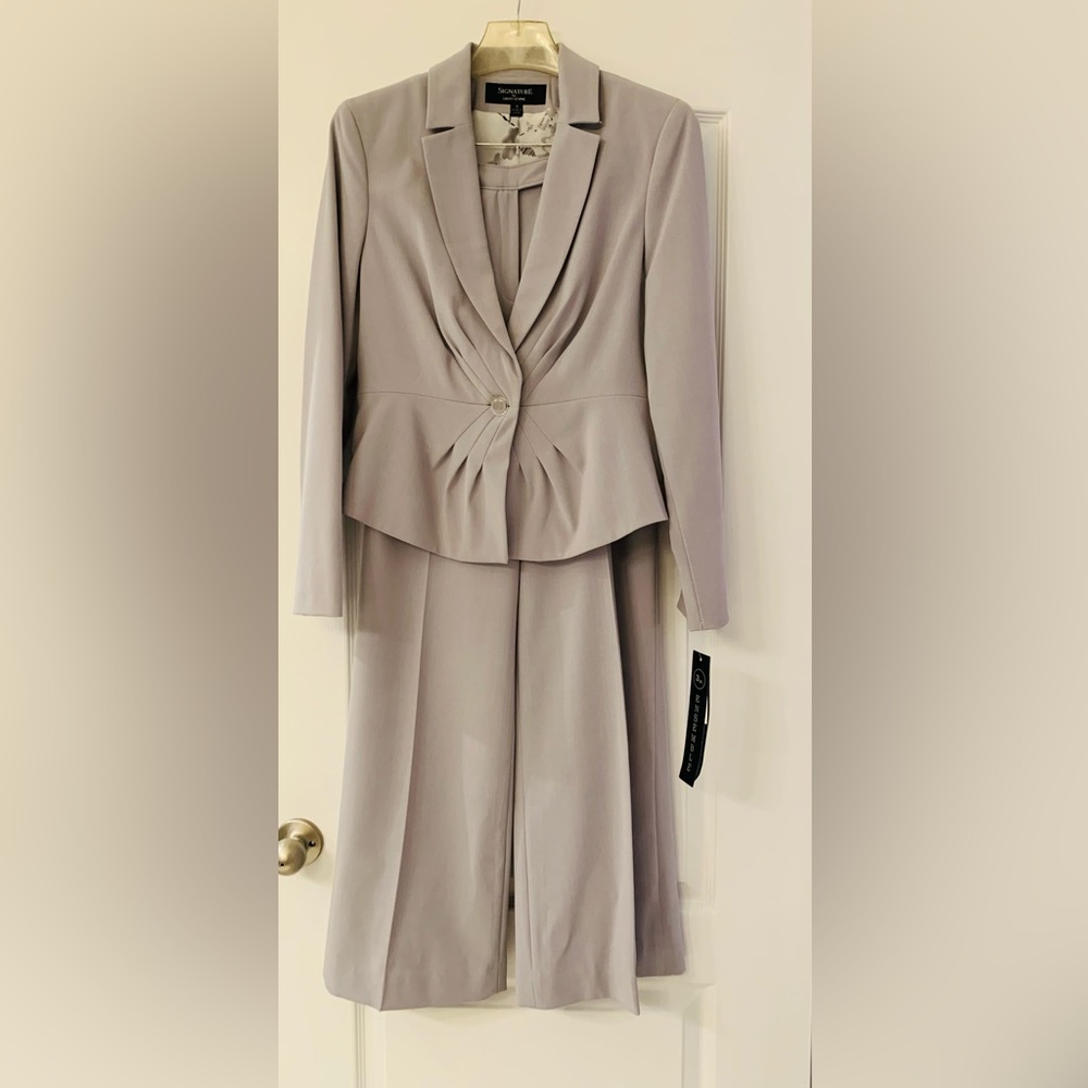 Elegant ladies suit - jacket and trousers